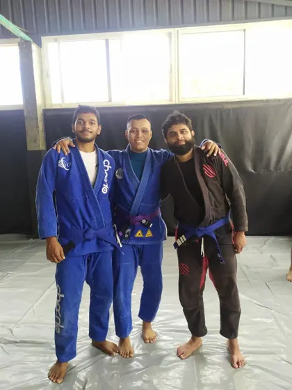 With my coaches and teammates after the grading ceremony. The support of your team is everything in this sport.
