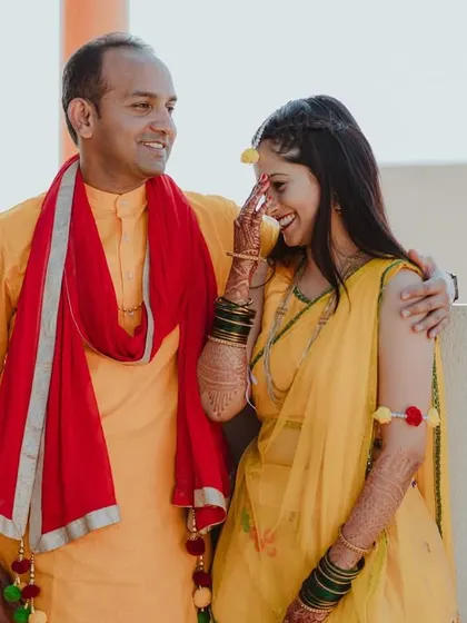 A sweet moment where Aishwarya laughs while Prasad looks on lovingly. It's these small, unscripted gestures that create the most cherished memories.