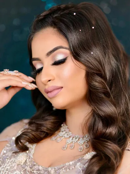 A close-up of a glamorous sangeet look. This showcases a flawless base that provides full coverage for acne-prone skin, paired with dramatic smokey eyes and a soft matte lip, proving that every skin story can have a glorious glam chapter.