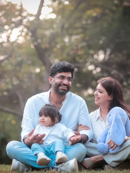 Another playful moment from the same outdoor family session, filled with smiles and natural interaction.