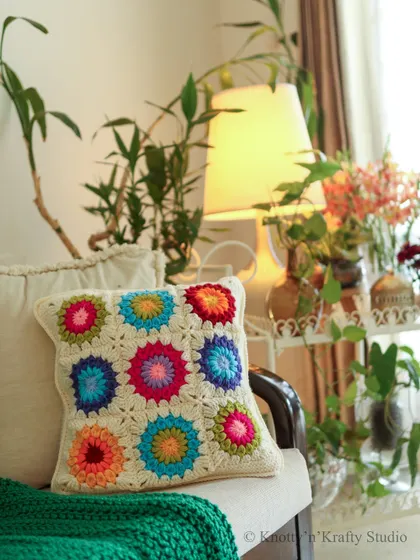 My favourite cozy corner, featuring a colourful floral granny square cushion. It’s a space filled with colour, calm, and a whole lot of handmade love.