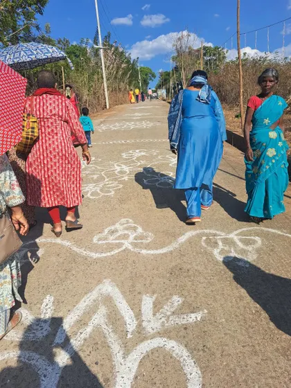 Walking on the roads decorated with rangoli for the procession. I was happy to see my mother and aunts join the dancing without a care in the world.
