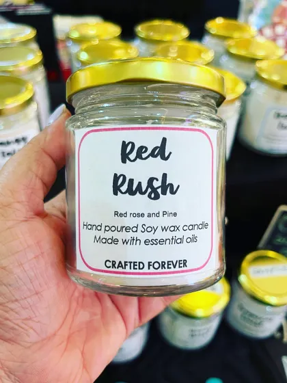 This is my "Red Rush" soy wax candle, a romantic blend of red rose and pine essential oils. All my candles are hand-poured with love.