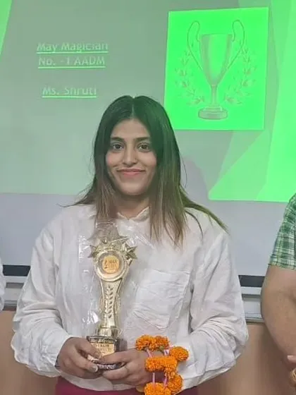 Holding a trophy for another achievement. Consistent performance is about discipline and focus, qualities that are critical when handling the detailed work of civil and banking law.
