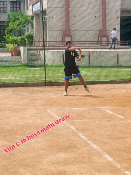 A backhand shot in action during the AITA U-16 boys' main draw. We ensure our players have solid, reliable backhands that can be used both defensively and offensively.