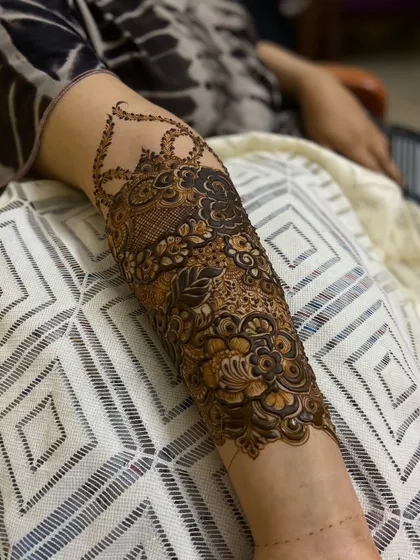This is a detailed view of my intricate bridal henna work. Each design is unique, combining traditional patterns like paisleys and mandalas with fine-line fillers to create a stunning, full-coverage look for your special day.
