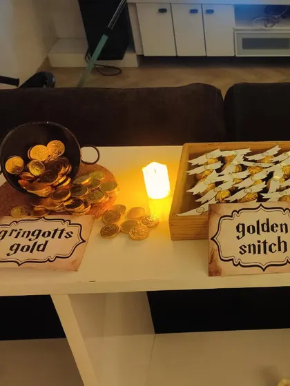 No wizard party is complete without treasure. Themed party favors like "Gringotts Gold" and "Golden Snitch" chocolates add to the immersive fun for all the guests.