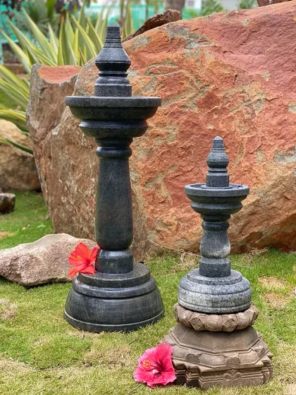 Our granite temple lamps are available in different sizes and finishes, perfect for adding a touch of tradition to your garden.