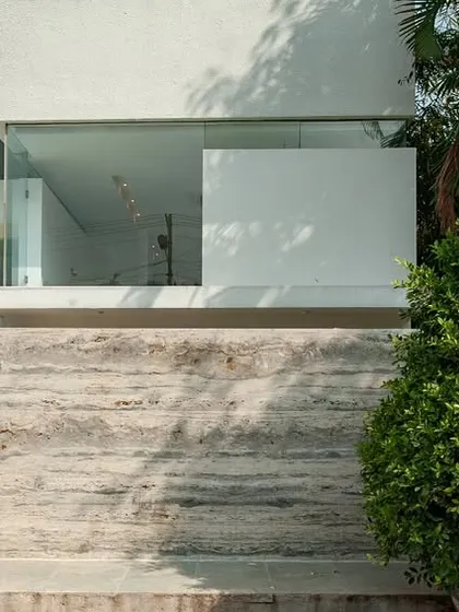 fenestrations… carefully placed windows and glass walls frame views and control light.