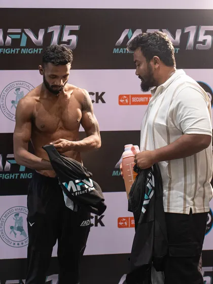 With my fighter Mridul after his weigh-in for MFN. As his coach and manager, I'm with him every step of the way, ensuring he's physically and mentally prepared.