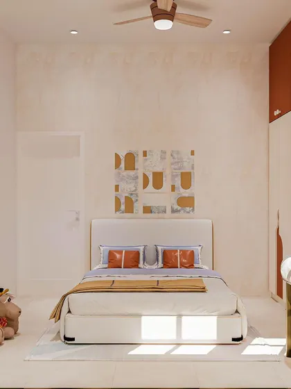 The room uses a textured paint finish and simple artwork to add character without clutter.
