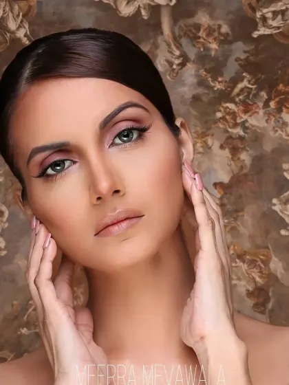 This is a classic 'straight makeup' look, designed for beauty and portfolio work. It features clean lines, a flawless complexion, and subtle enhancements that define the model's features without looking heavy.