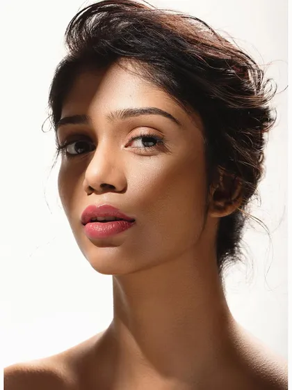 This shot demonstrates the power of shadow play. Using a single light source, I created a high-contrast look that sculpts the face and adds a layer of mystery. This is a great technique for creating more dramatic actor headshots.