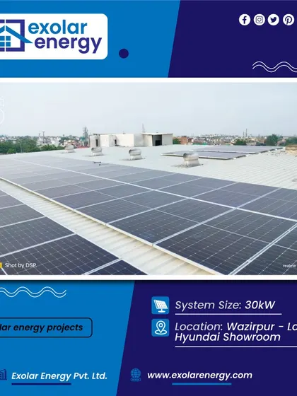 A wide shot of the 30 kW solar installation at the Lamba Hyundai Showroom in Wazirpur, showcasing the clean and organized panel layout on a large commercial roof.