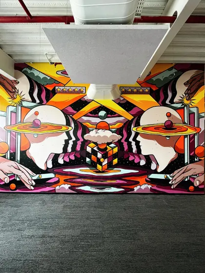 A full view of the large-scale mural I designed and executed for the Rippling office in Bangalore. This piece visualizes the concept of a "ripple effect," celebrating human-centric customer support through a surreal, cosmic landscape. I manage mural projects from the initial digital design to overseeing the on-site painting.