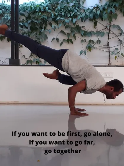 "If you want to be first, go alone. If you want to go far, go together." This proverb reflects our mission to support students and teachers in developing confidence and expertise on their yoga journey, as seen in this Eka Pada Bakasana.