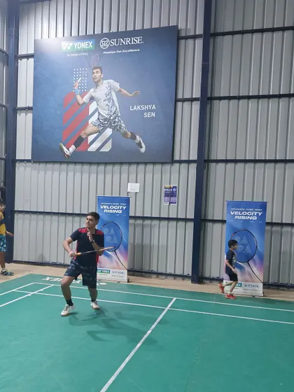 Players engaged in a rally during the demo day. It's a great chance for them to play with different partners and experience a friendly, competitive environment.