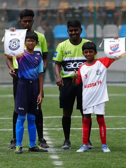 Team captains ready for the coin toss, representing their teams with pride.