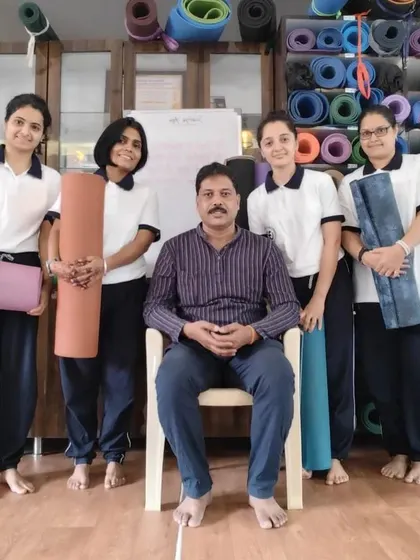Posing with a group of dedicated students. It is rewarding to see their progress and be a part of their health journey.