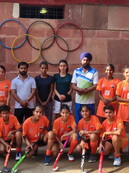 My ladies' team during an exhilarating tournament in Gwalior. The Olympic rings in the background are a constant reminder of the ultimate goal.