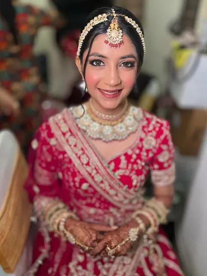 Another angle of Jinal's phera look, showing how the makeup looks beautiful from all sides. The soft blush adds a lovely, youthful flush.