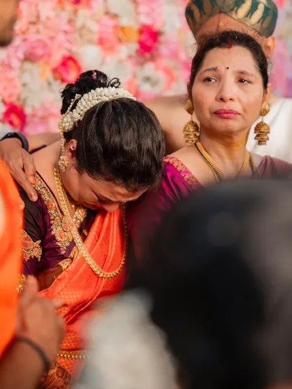 A quiet, emotional moment for the mother of the bride. The makeup is subtle and elegant, designed to enhance her features and last through the day's events.