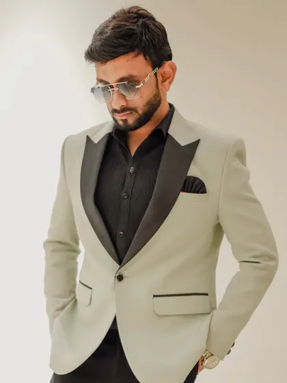 A posed shot capturing the sleek silhouette of my formal attire. My goal is to always present a polished and sophisticated image on behalf of my clients.