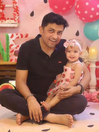 A proud dad with his 'one in a melon' little girl. Capturing these sweet parent and child moments during a cake smash session is just as important as the cake itself!