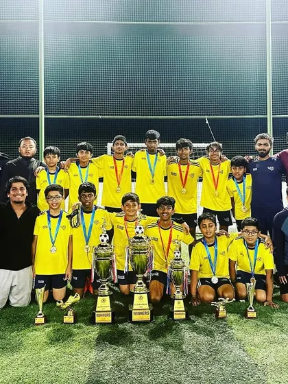 The victorious Under-15 team and coaches after winning the All Star Super Cup. This picture represents the culmination of months of hard work and dedication.