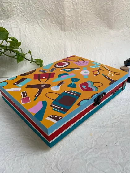This view highlights the depth of the box and the colorful, hand-painted sides.