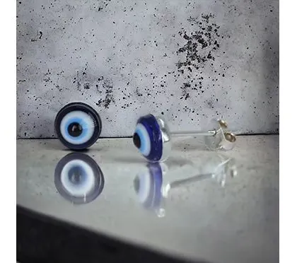 These simple evil eye stud earrings are perfect for daily protection and style. The classic blue and white design is set in pure 92.5 silver.