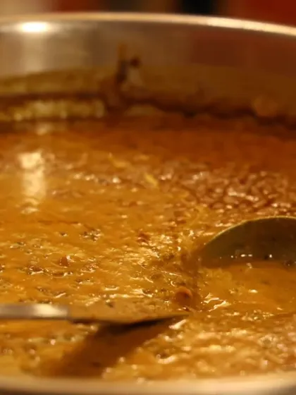 A large pot of our authentic Andhra sambar, a lentil-based stew that is a cornerstone of South Indian cuisine.