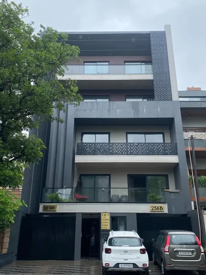 A real photograph of a completed residential facade in Delhi. This showcases the final product of our integrated design and construction process.