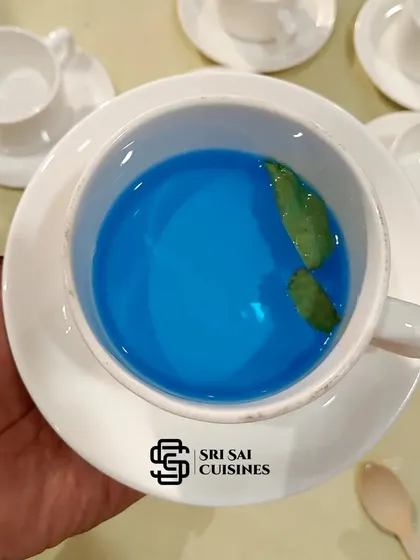 This is my Angel Tea, a naturally blue tea made from butterfly pea flowers. It has a subtle flavor and a stunning color that always surprises and delights guests.