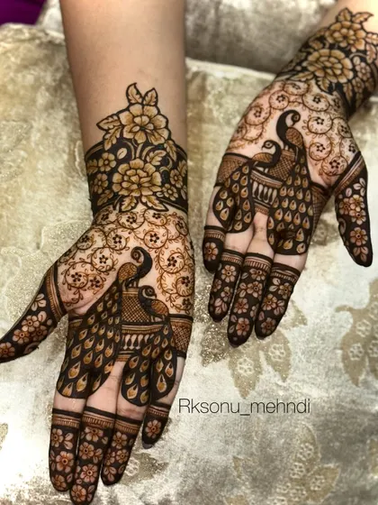 This gallery showcases a variety of my traditional designs. You'll find classic elements like peacocks, elephants, lotuses, and intricate jaali (net) patterns, all expertly crafted to create timeless beauty.