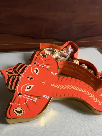 The intricate design of the Ganesha box lid makes it a beautiful keepsake long after the festival is over.