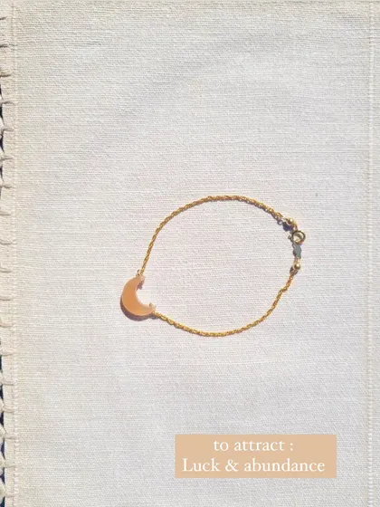 The 'kháray' Peach Moonstone Luna bracelet, designed to attract luck and abundance.