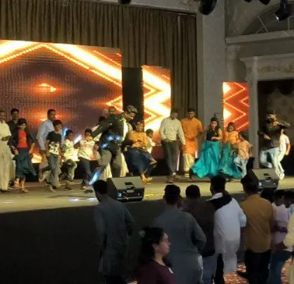 Another angle of the Cipla event, showing the depth of the hall and the professional stage lighting rig.