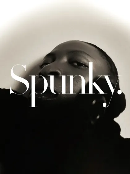 A creative and graphic black and white portrait. The unusual angle and the bold text overlay make this a unique and modern image.
