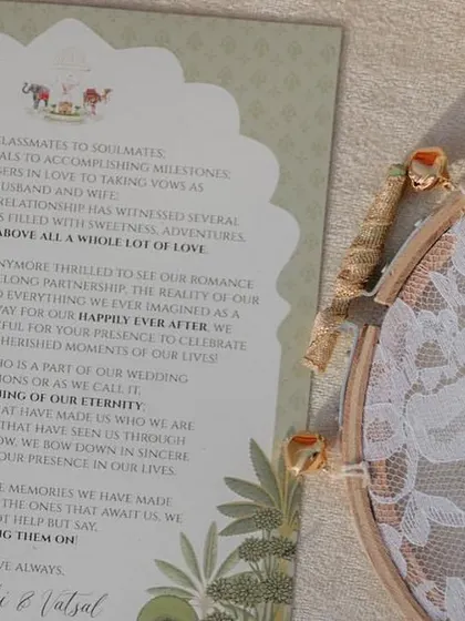 A close-up of the heartfelt letter sharing the couple's eleven-year love story. Personalization like this creates a deep, emotional connection with guests.