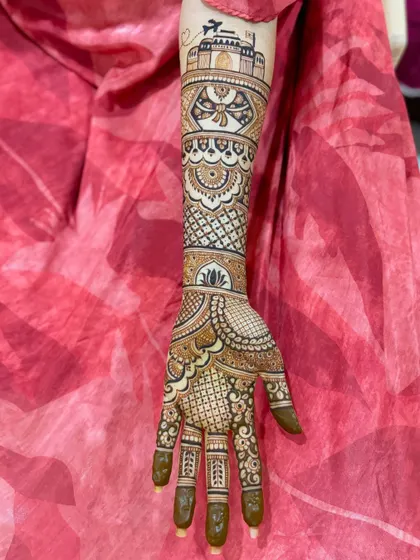 A close-up of the right arm from the travel-themed design, showing the intricate details of the Taj Mahal and the patterns surrounding it.