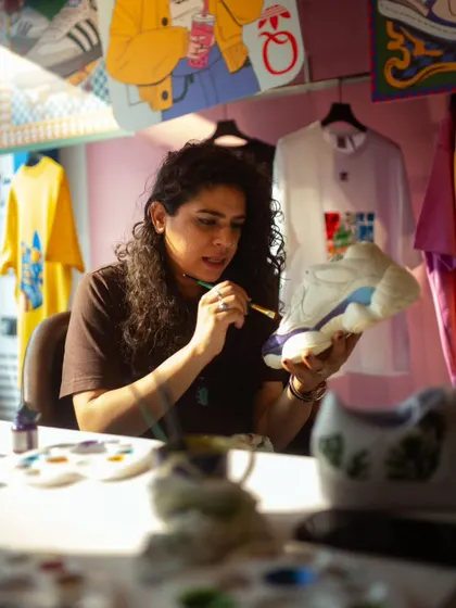 Me in my element, painting a shoe live at the Adidas store in Bangalore. It's an incredible feeling when people come up to chat about my art and share their own ideas.