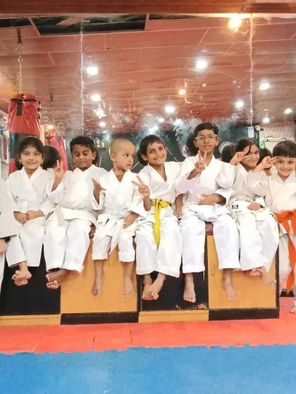 The spirit of our kids' class. They are taught to be strong and focused, but also to enjoy the process and support each other.
