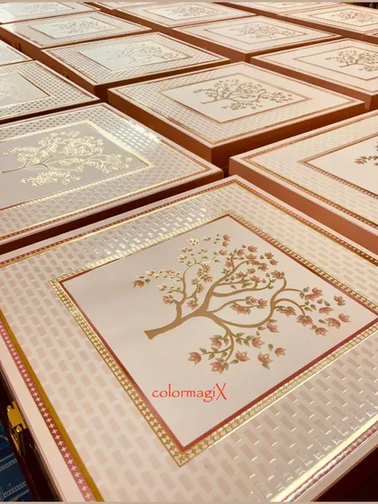 A large order of our custom-designed wedding gift boxes. The elegant tree-of-life motif with gold foil detailing makes these boxes a beautiful and memorable choice for wedding favors.