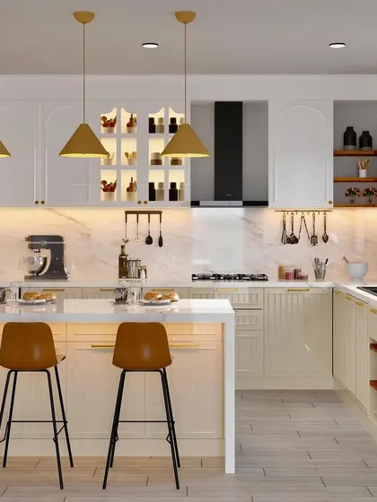 A full view of a luxurious kitchen with a breakfast bar, featuring a mix of open and closed storage, a statement chimney, and elegant pendant lighting.