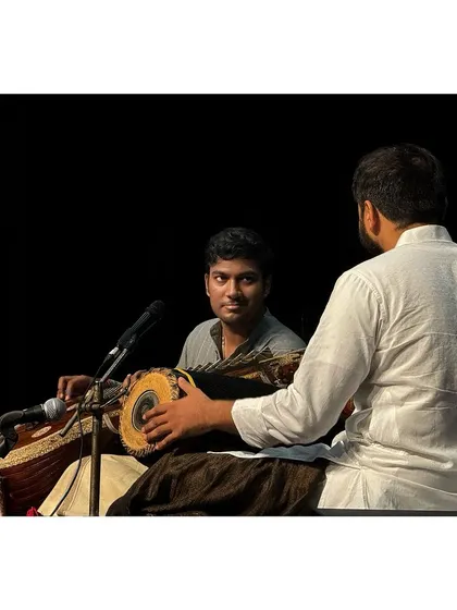 A candid moment of interaction with my co-artist during the Ranjani Memorial Concert. The silent communication between musicians on stage is a beautiful part of the performance.