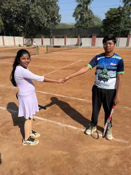 Another display of good sportsmanship at the conclusion of a match. These tournaments are crucial for learning how to compete.