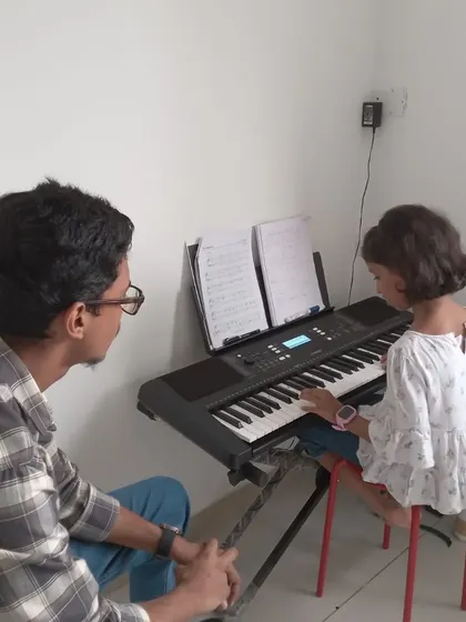 Another shot of a one-on-one keyboard lesson. We create a comfortable environment for students to learn and ask questions.