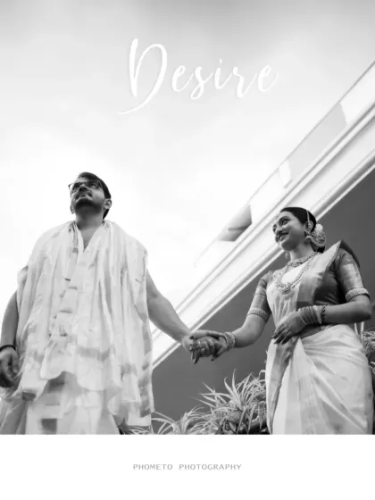 A creative black and white shot of the couple holding hands, viewed from a low angle to create a sense of aspiration and desire.