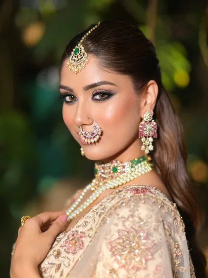 A close-up of the smokey eye and flawless skin. This look is a perfect example of modern bridal glam, combining classic techniques with a contemporary edge.